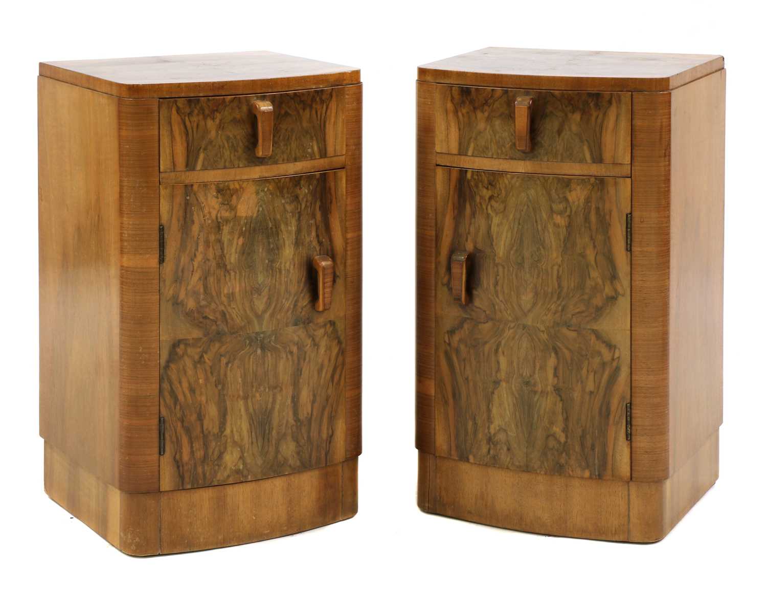 Lot 235 - A pair of Art Deco walnut bedside cabinets