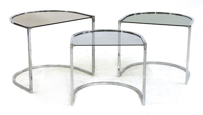 Lot 584 - A chrome nest of three tables