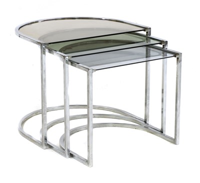 Lot 584 - A chrome nest of three tables