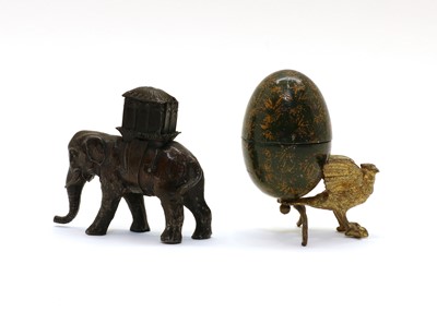 Lot 137 - Two novelty thimble holders