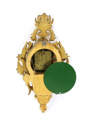 Lot 326 - A Swedish carved wood and gilt cartel wall clock