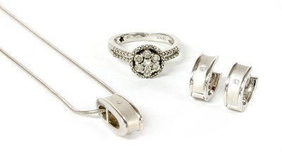 Lot 253 - A silver diamond set pendant, by White Ice