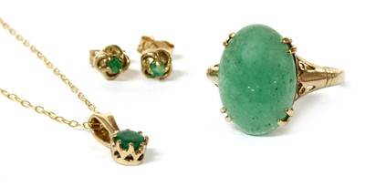 Lot 201 - A gold single stone emerald pendant