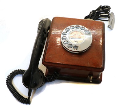 Lot 167 - A wall-mounted telephone