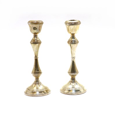 Lot 36 - A pair of silver candlesticks