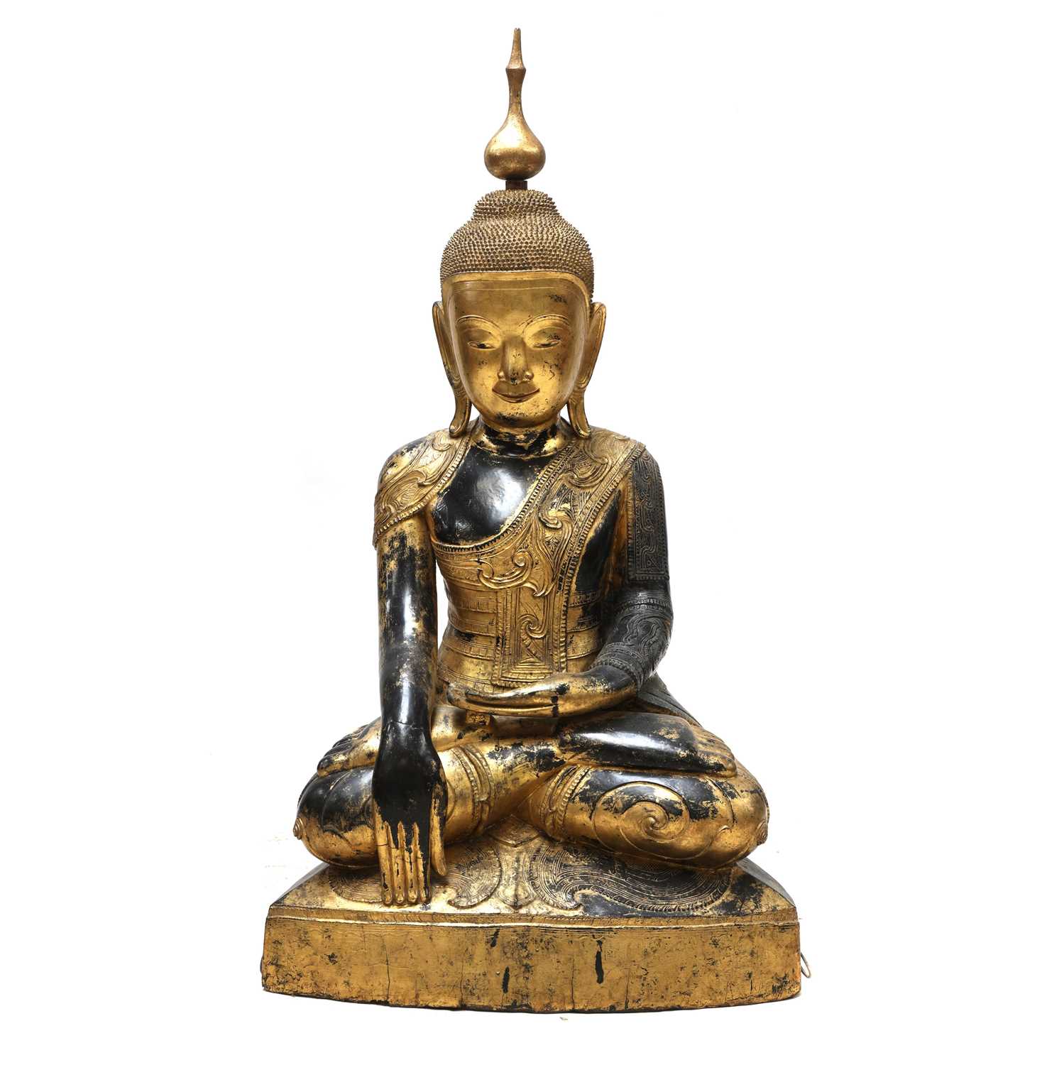 Lot 70 - A large South-East Asian wooden and lacquered Shakyamuni buddha