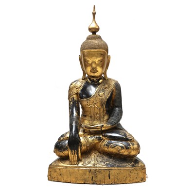 Lot 70 - A large South-East Asian wooden and lacquered Shakyamuni buddha