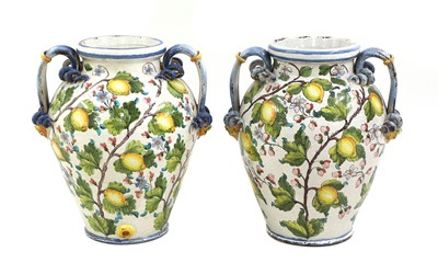 Lot 695 - A pair of large tin-glazed earthenware jars