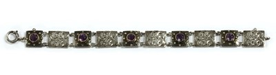 Lot 35 - An Arts & Crafts silver amethyst set bracelet by Murrle Bennett & Co., c.1910