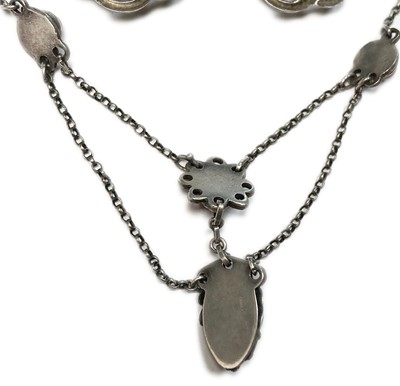 Lot 36 - A Birmingham school Arts & Crafts silver cornelian swag necklace
