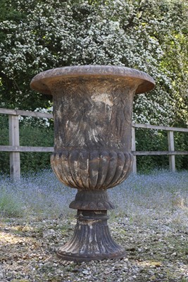 Lot 794 - A cast iron campana garden urn