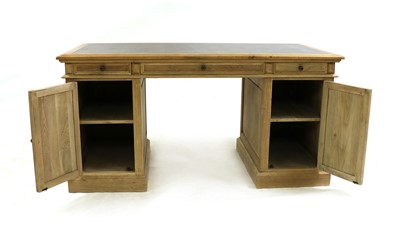 Lot 415 - A modern oak twin pedestal desk