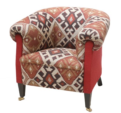 Lot 843 - An upholstered armchair