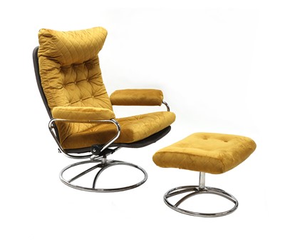 Lot 661 - A Norwegian 'Stressless' reclining armchair and footstool