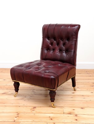 Lot 842 - A leather button-upholstered slipper chair