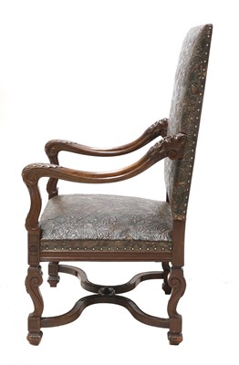 Lot 854 - A leather armchair