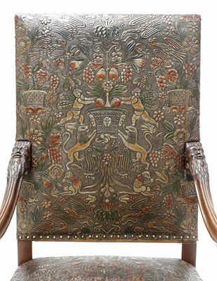 Lot 854 - A leather armchair