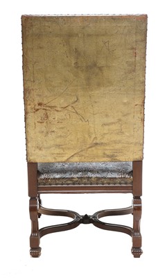 Lot 854 - A leather armchair