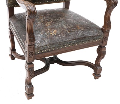 Lot 854 - A leather armchair