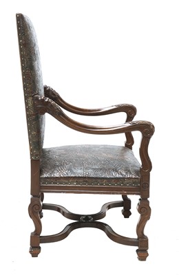 Lot 854 - A leather armchair