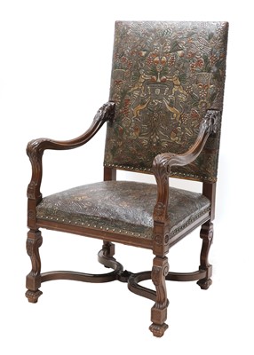 Lot 854 - A leather armchair