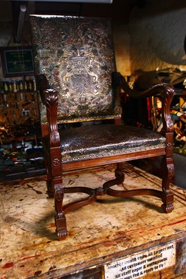 Lot 854 - A leather armchair