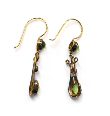 Lot 196 - A pair of silver and gold, peridot, amethyst and diamond drop earrings
