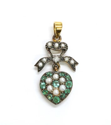 Lot 145 - A silver and gold, emerald, diamond and split pearl drop pendant