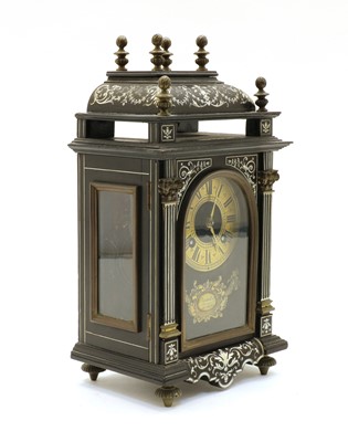 Lot 219 - A small 19th century Renaissance revival ebony veneer, ivory and gilt metal mantel clock