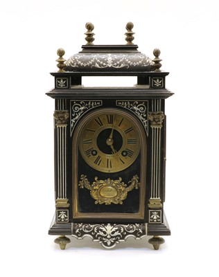 Lot 219 - A small 19th century Renaissance revival ebony veneer, ivory and gilt metal mantel clock