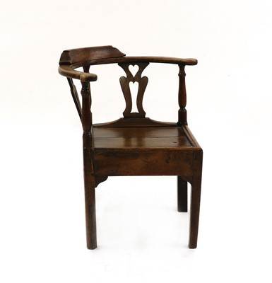 Lot 406 - An 18th/19th century oak corner chair