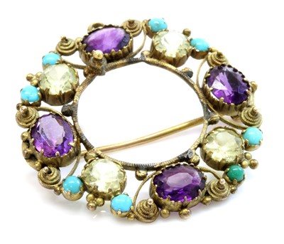 Lot 24 - A Regency gold amethyst, chrysolite and turquoise cannetille brooch/pendant