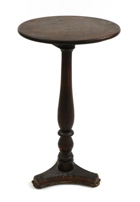 Lot 413 - A provincial antique tilt top occasional table