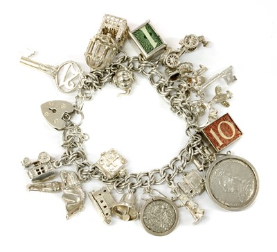 Lot 251 - A sterling silver charm bracelet