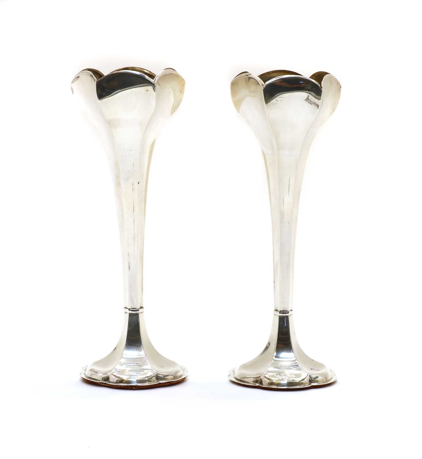 Lot 57 - A pair of Edwardian silver vases with six sided tulip shaped bowls
