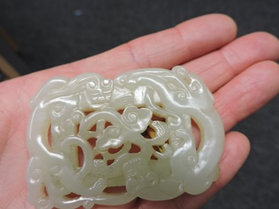 Lot 282 - A Chinese jade plaque