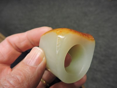 Lot 254 - A Chinese jade archer's ring