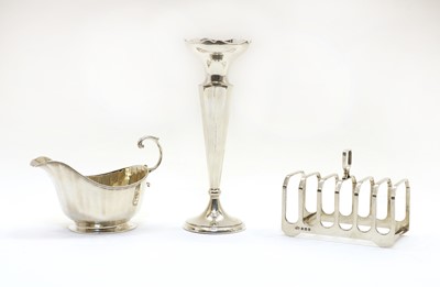 Lot 30 - A modern silver six division toast rack by Elkington & Co