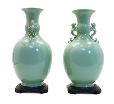 Lot 153 - A pair of Chinese celadon vases