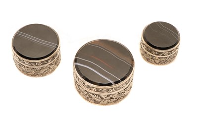 Lot 39 - A set of three graduated silver banded agate boxes