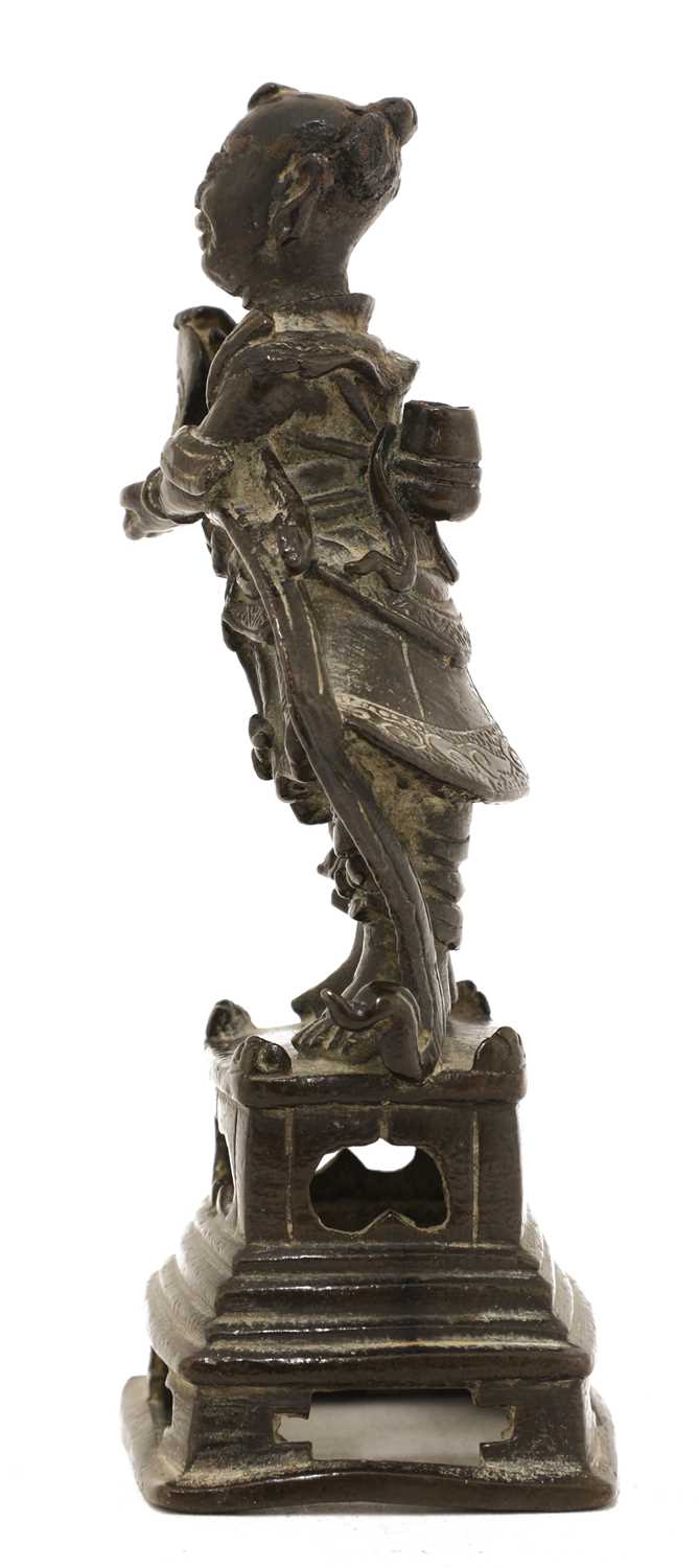 313 Figure Lot 313 - A bronze figure,