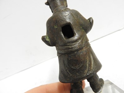 Lot 92 - A Chinese bronze figure