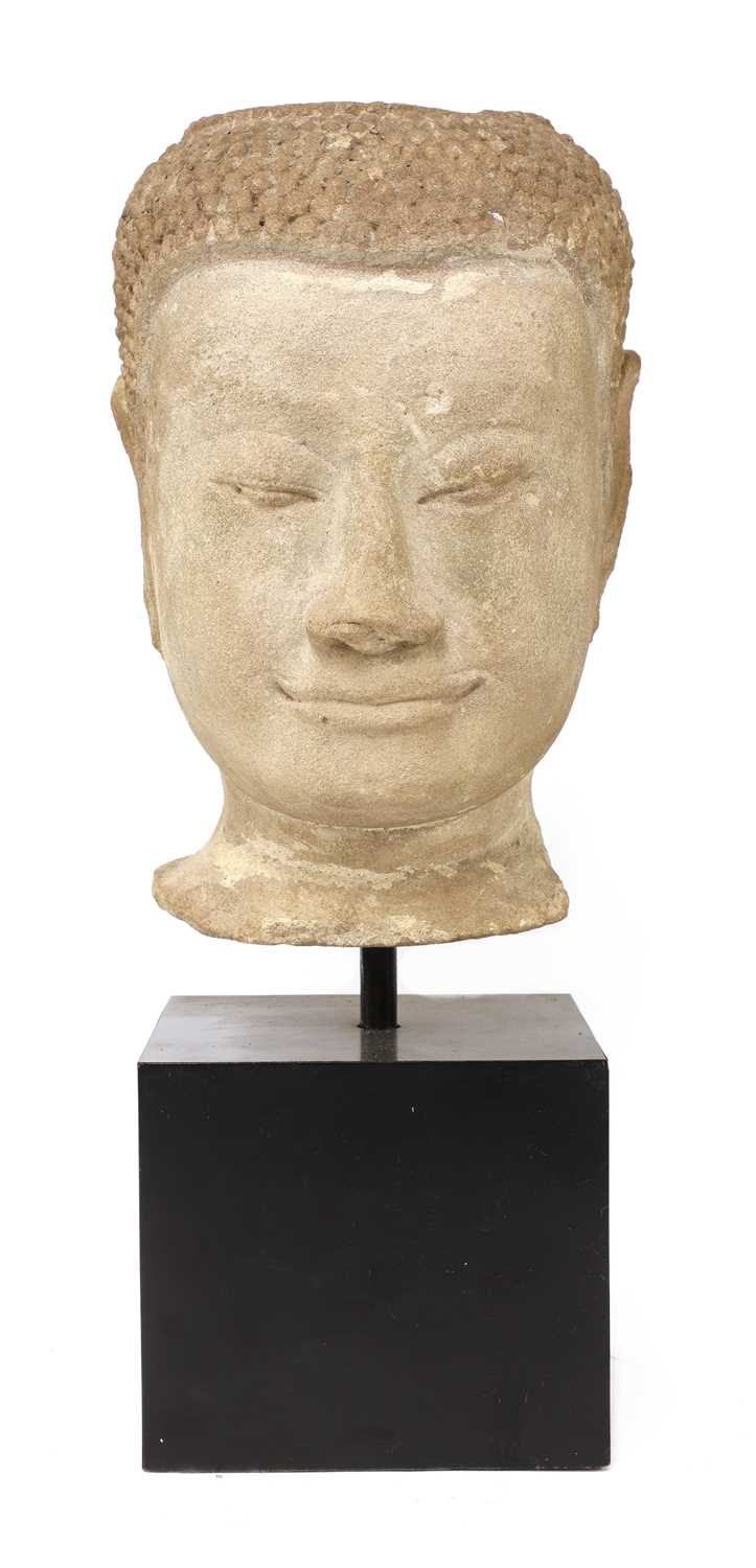 Lot 83 - A carved stone head of Buddha