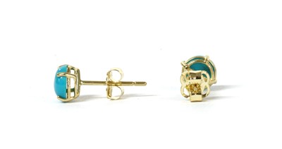 Lot 205 - A pair of gold single stone turquoise stud earrings