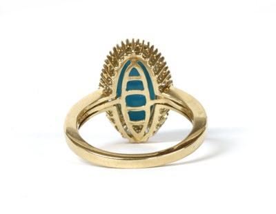 Lot 204 - A gold turquoise and diamond cluster ring