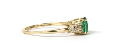 Lot 199 - A gold emerald and diamond ring