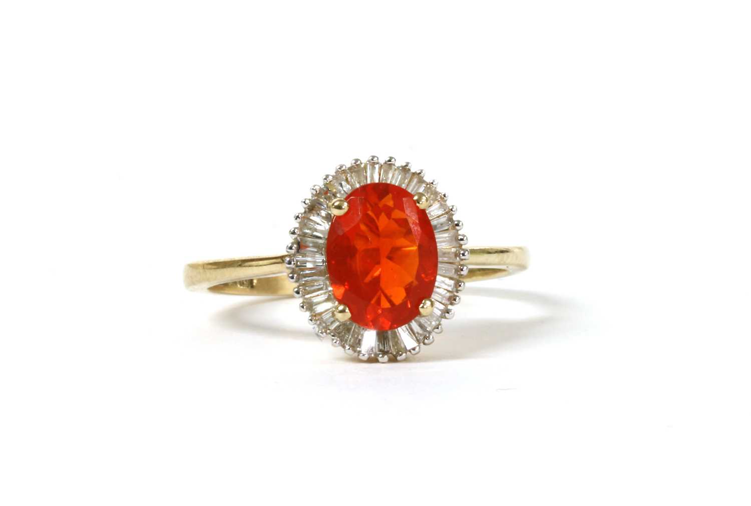 Lot 184 - A gold fire opal and diamond cluster ring