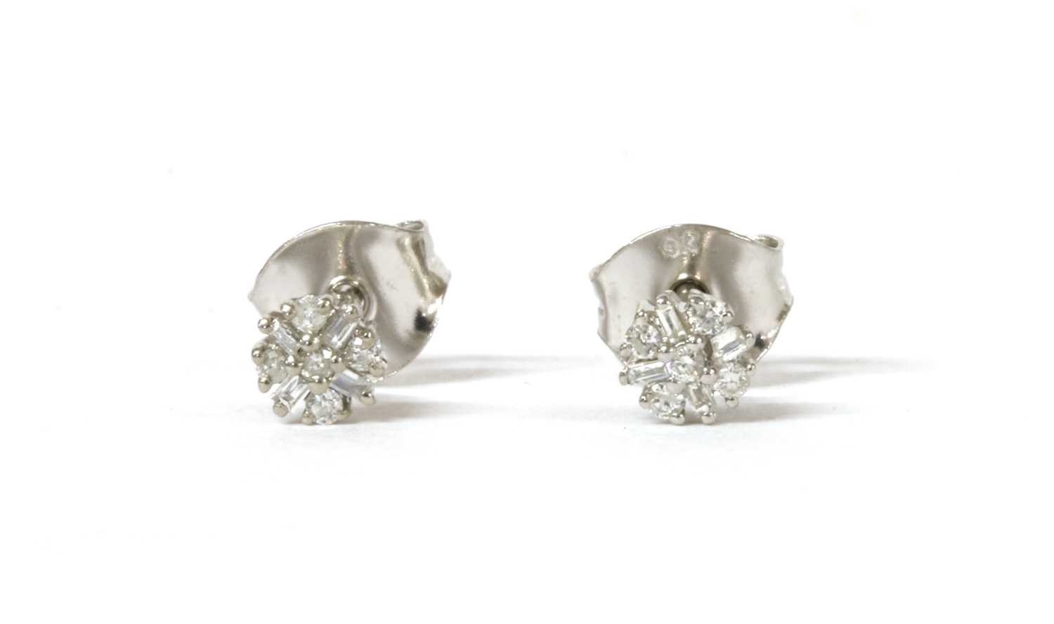 Lot 126 - A pair of white gold diamond cluster stud earrings