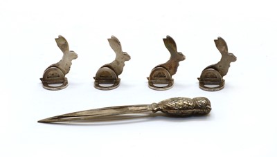 Lot 48 - Four novelty silver hare menu holders