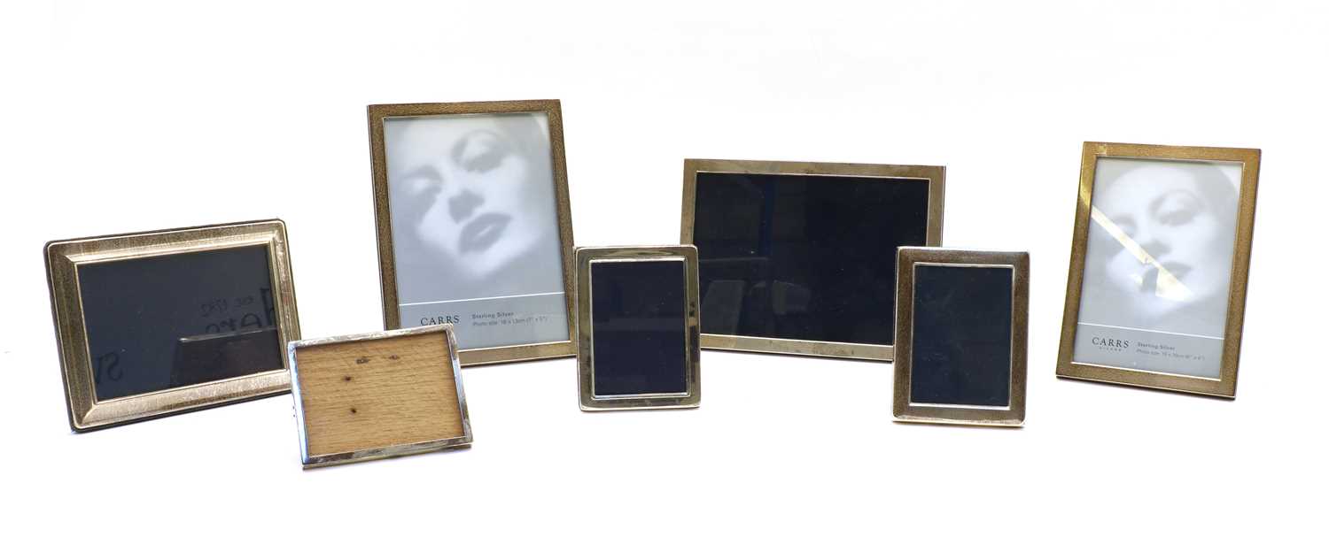 Lot 99 - A collection of seven silver easel backed photograph frames